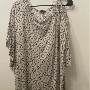 Gray with blue design. Cold shoulder on one side